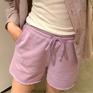 Ganni embroidered-logo drawstring cotton shorts​​